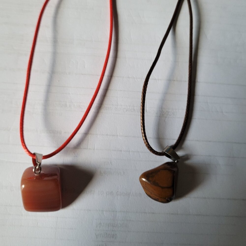 Triangular Cats Eye Pendant on Brown Cord and Brown Gem Stone on Red Cord